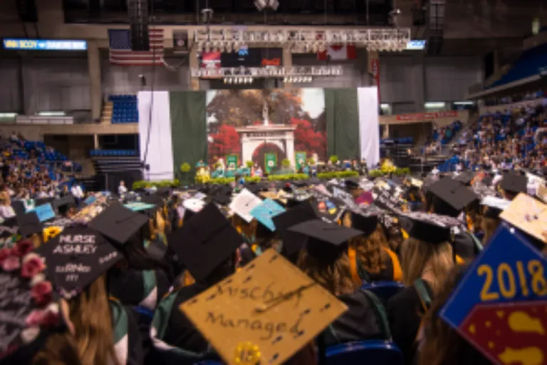 Sister Mary Persico delivers a message to the 100th graduating class.