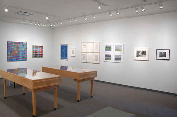 A exhibit room with multiple art exhibits from Marywood Students