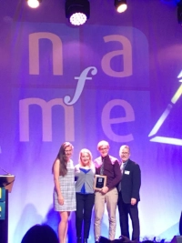 Marywood students accept award at NAfME Convention.