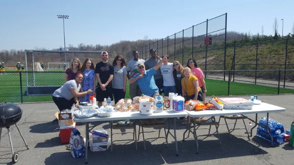 Marywood's Accounting and Finance Club standing behind a picnic table.