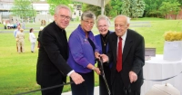 Monsignor Joseph Quinn, friend of the University, Sr. Mary Persico, IHM, President, Michael Delfino and Gwen Calabro Delfino '47