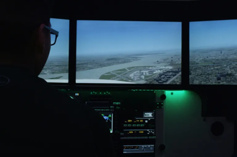 aviation student in flight simulator marywood university