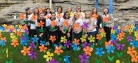 Student class photo with flowers