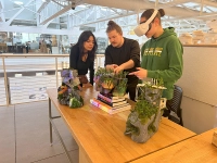 student using vr headset while faculty member shows something to other student standing there Beyond Blueprints: Exploring Career Paths in Virtual Architecture