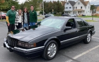 Marywood students stand near a classic Cadillac that was featured in the inaugural Crusin' for a Cause