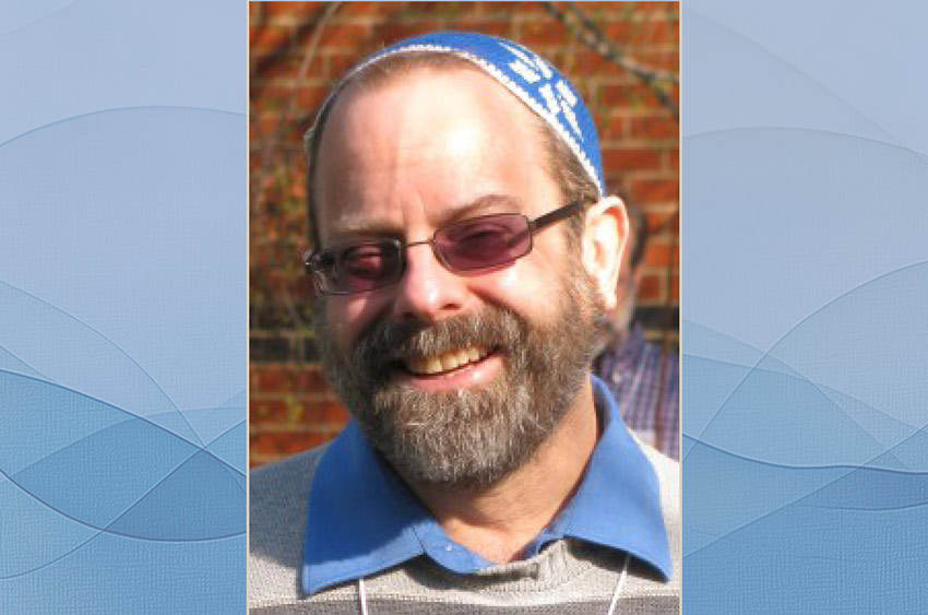 A photo of Rabbi Swartz is situated on a blue background